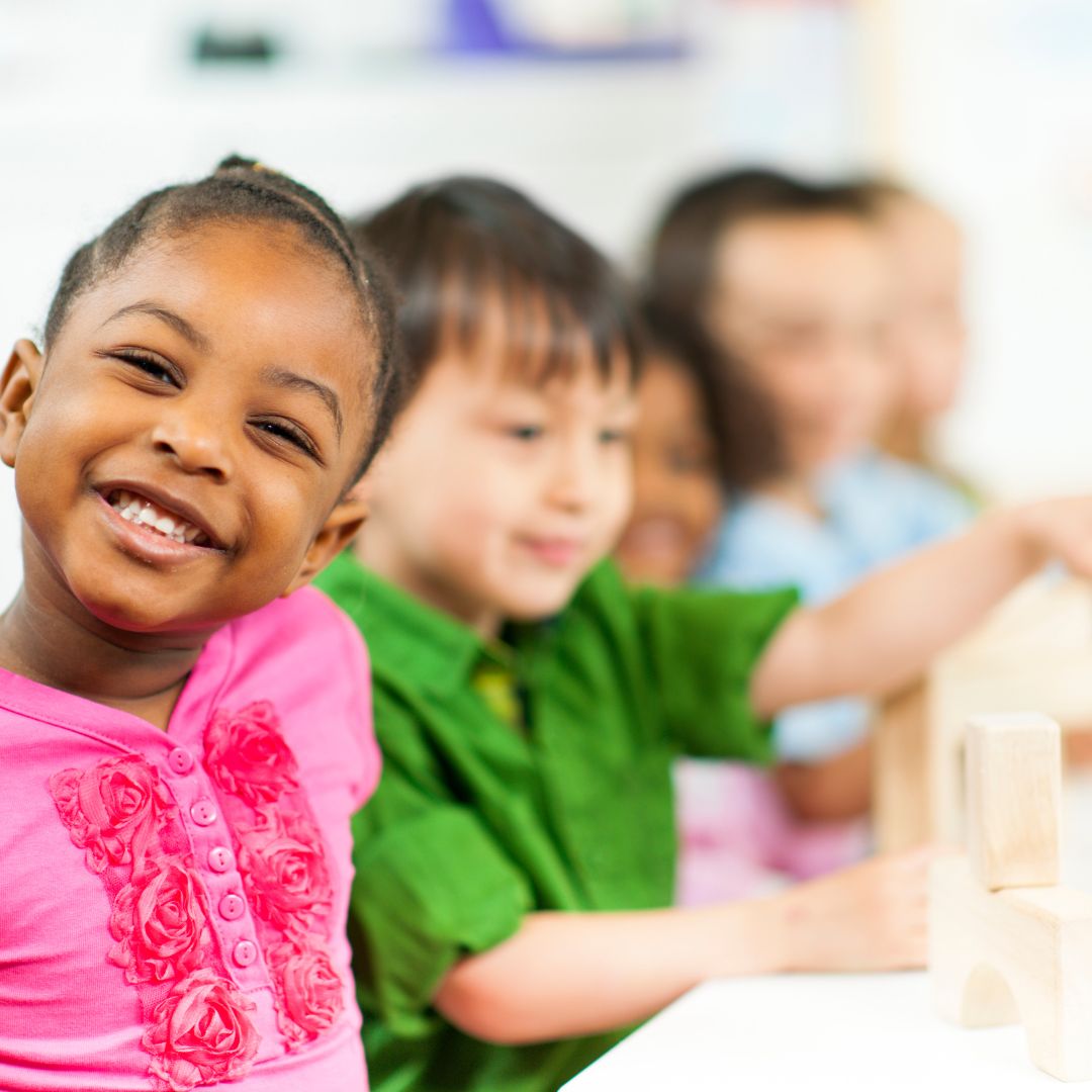 Group of preschool students engaged in a creative learning activity at Creative Learners Academy
