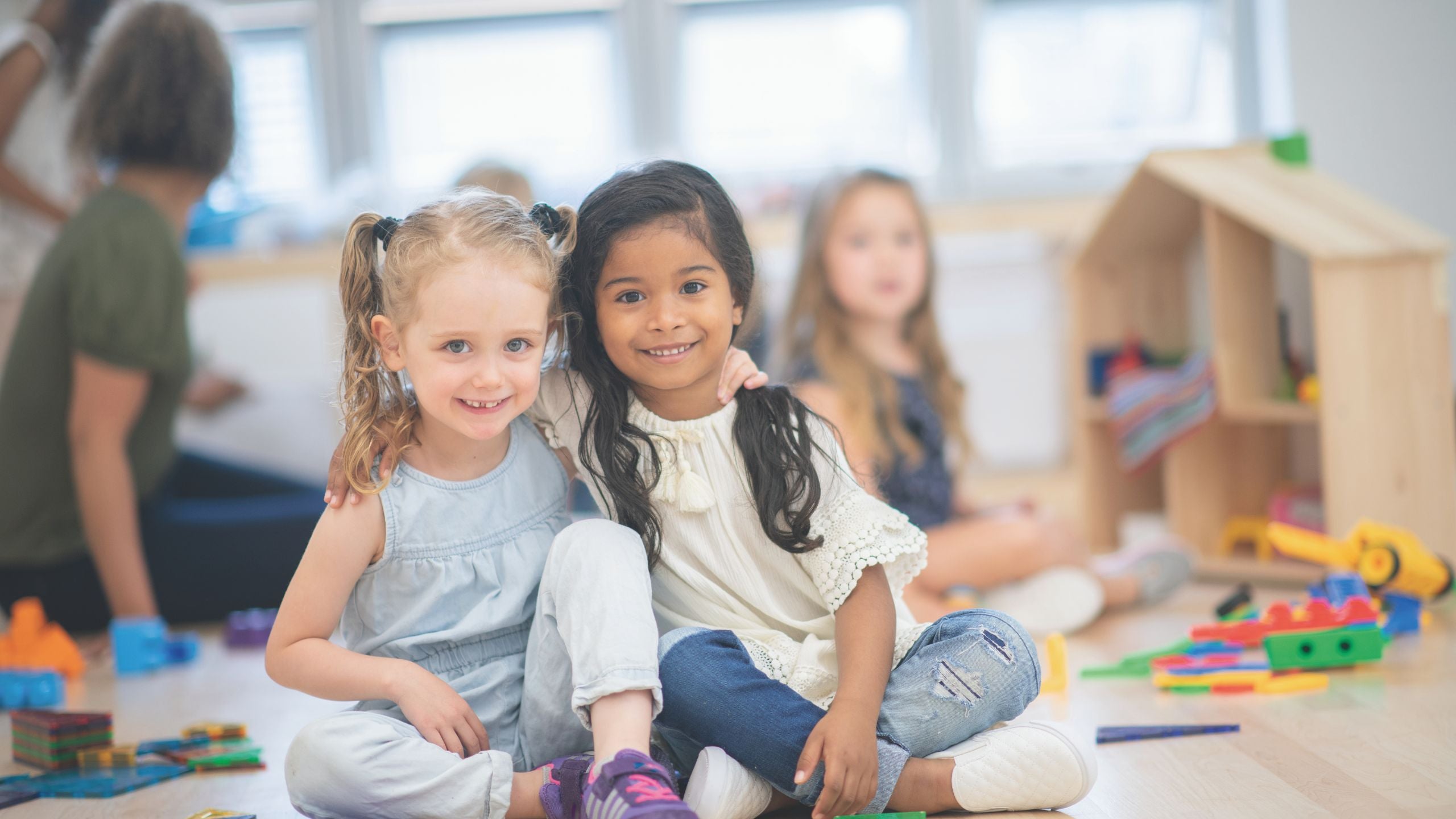 Group of preschool students engaged in a creative learning activity at Creative Learners Academy