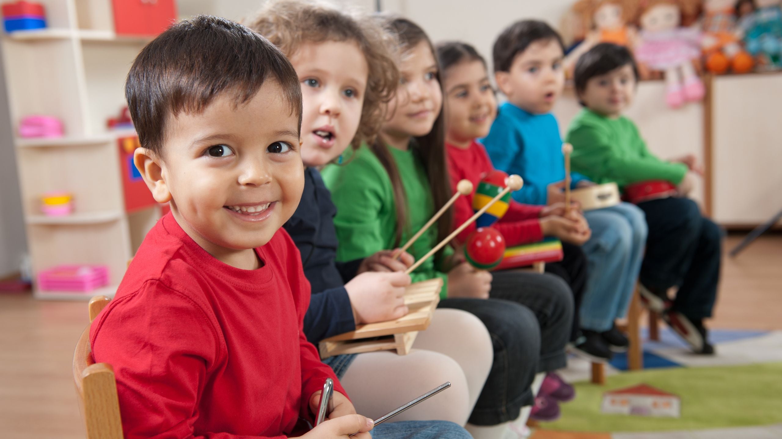 Group of preschool students engaged in a creative learning activity at Creative Learners Academy